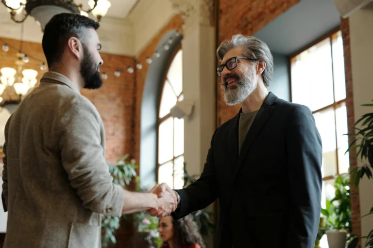 Manfaat Website untuk Perusahaan: Strategi Pertumbuhan Bisnis 1 Business Office Professional Handshake